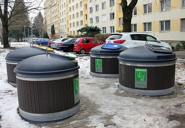 Semi-underground municipal waste containers