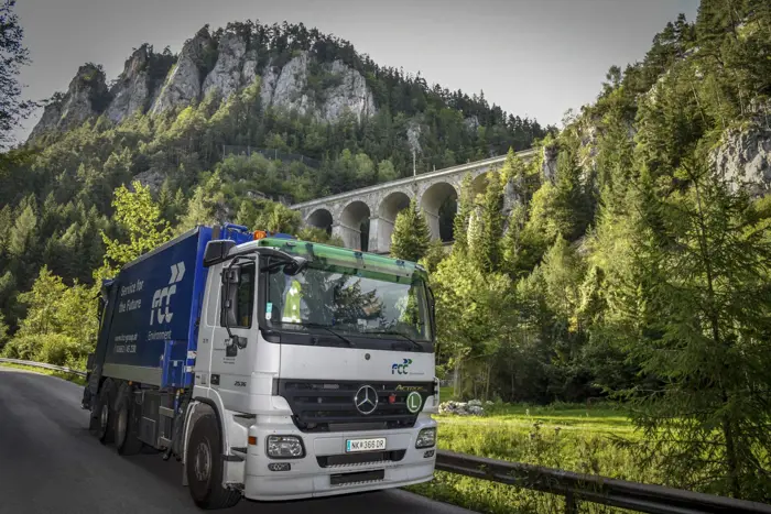 FCC truck next to a viacuct of UNESCO Semmering Railway