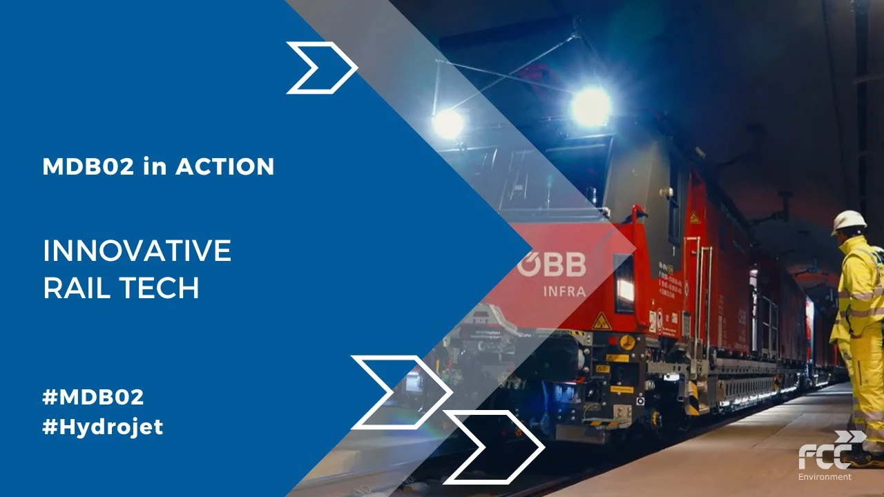 Thumbnail for FCC Environment video "MDB02 in Action: Innovative Rail Tech", featuring an ÖBB Infra rail vehicle in a tunnel with a worker in high-visibility gear standing trackside.