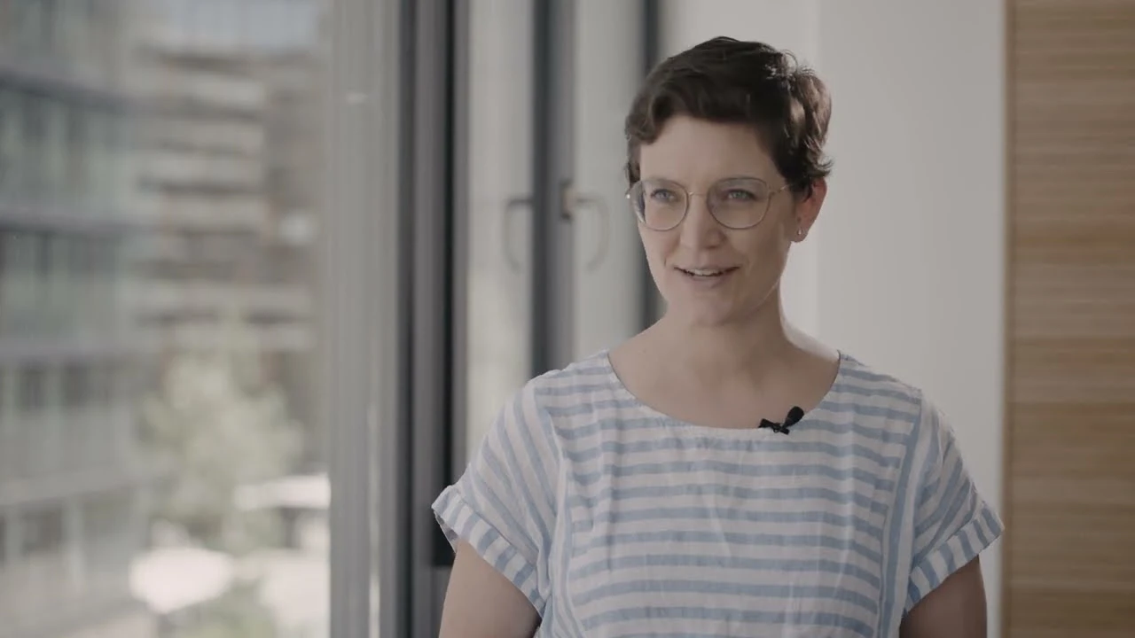 Thumbnail for FCC Environment video "See and Hear Our Team: Candid Conversations About Life at FCC Environment CEE", featuring Nora Bohrn, FCC sustainability expert, speaking near a window in an office setting.
